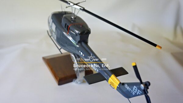 Model of UH-1N Twin Huey US NAVY 103 Aircraft with detailed craftsmanship.